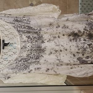Beautiful ivory top with lace sleeves